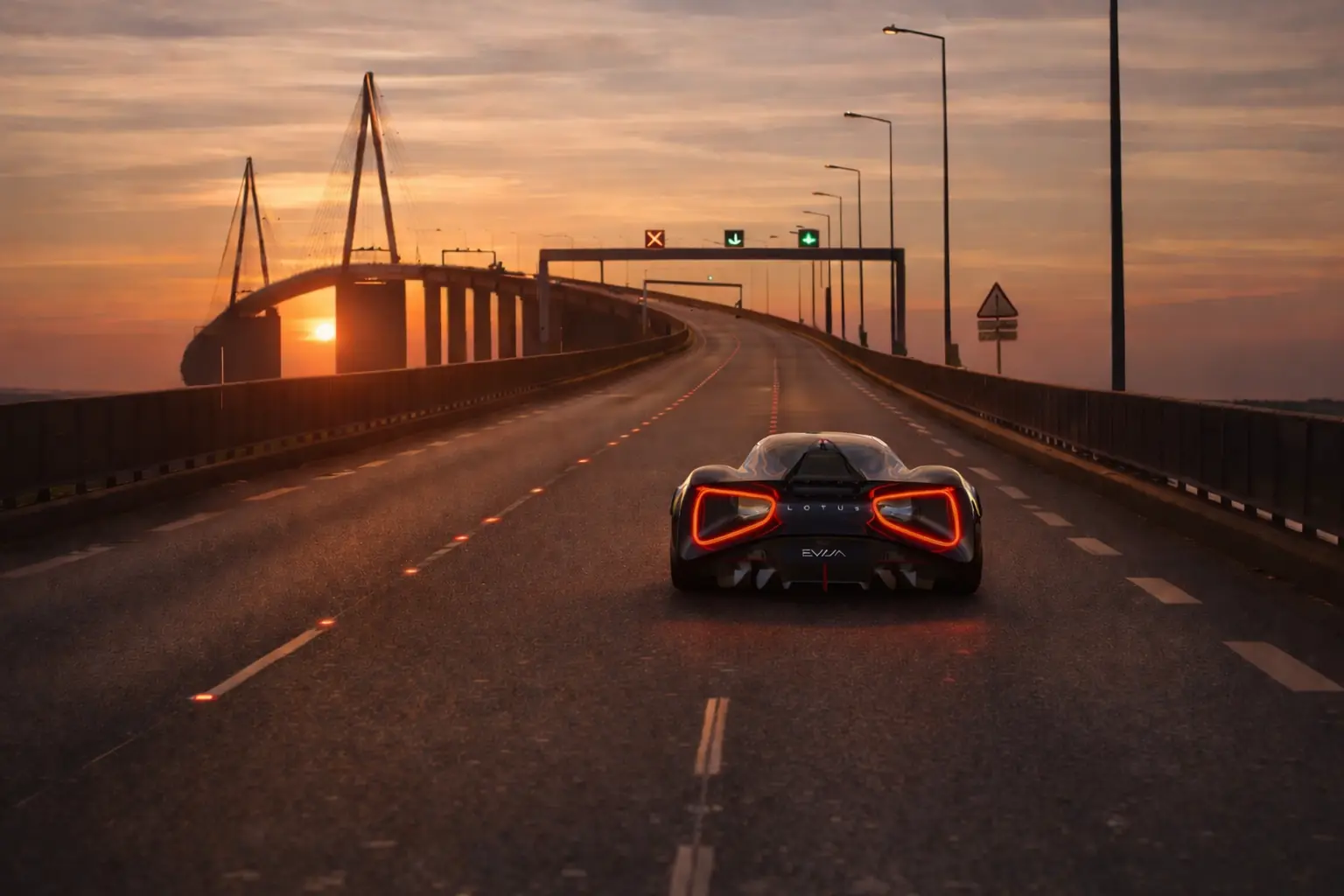 Lotus Evija driving onto a bridge toward the setting sun